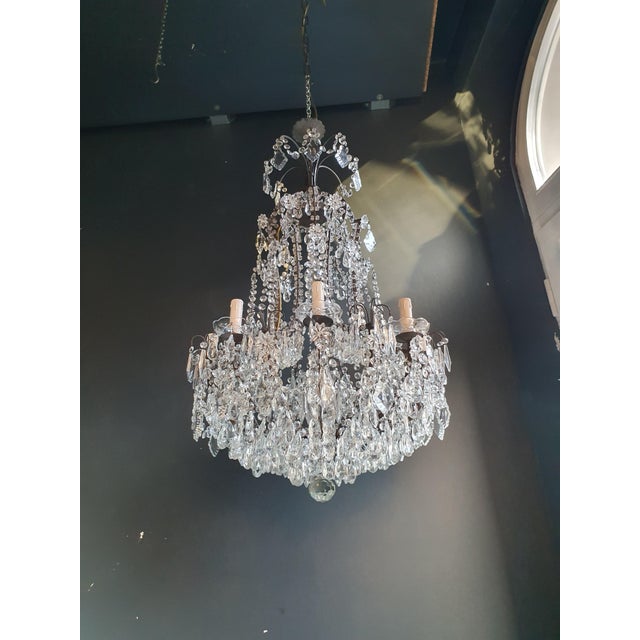 Vintage Chandelier Lovingly Restored in Berlin, Ready to Illuminate Your Space Presenting a captivating vintage chandelier...