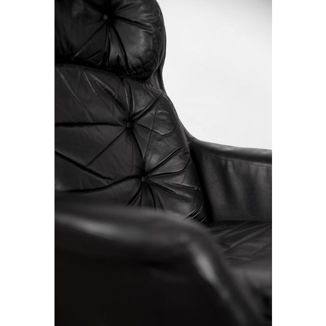 This modernist swivel armchair was manufactured by Selig Imperial in Sweden during the 1970s. The armchair is made of...