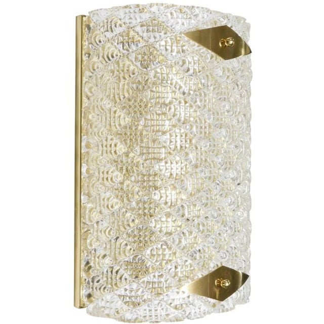 A stunning pair of Italian wall sconces or flush mounts, each featuring handblown clear Murano glass intricately textured...