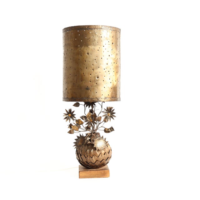 Striking vintage table lamp featuring an ornate brass base with floral and foliate motifs: Hollywood Regency meets...
