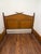 British Colonial Burnt Bamboo Queen Bed in as found vintage condition. Originally retailed by Bloomingdales. A mid-century...