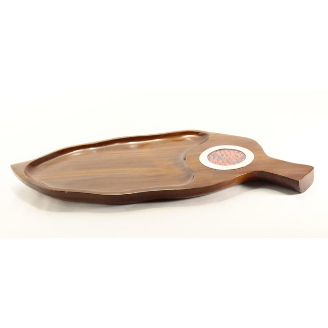 An impressive leaf shaped tray or serving dish for nuts, candies etc. Carved from a single piece of the exotic cumaru wood...