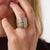 This striking vintage diamond cocktail ring is a glamorous 1980’s design, set with 36 round brilliant cut diamonds...