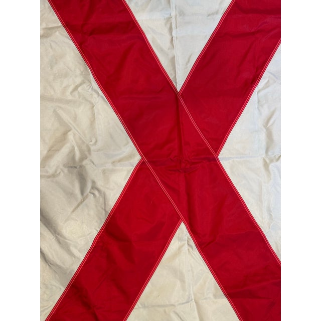 This is a late 20th century Alabama state flag made by Valley Forge Flag. It features a crimson cross on a white...