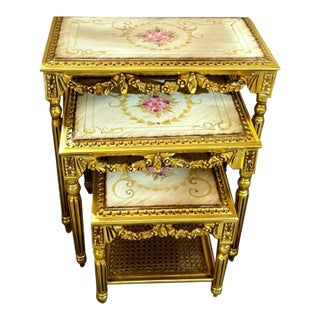 French Style Nesting Tables – Set of 3 With Glass Tops, Gold Frames & Floral Center Detail For Sale