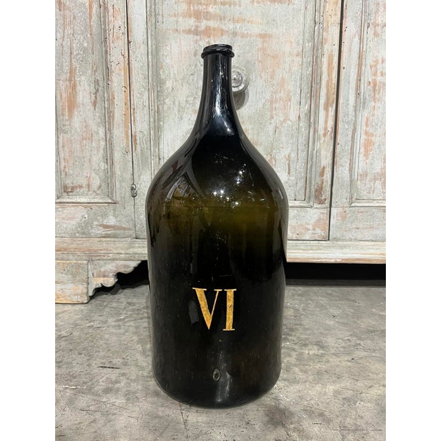More information coming soon… Originally used to ferment wine at a vineyard in Normandy, France, this brown glass wine...