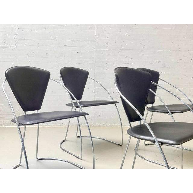 Elegant vintage dining chairs, model linda, from the 1980s, designed by lo studio and designer a. Rizzatto. The design...