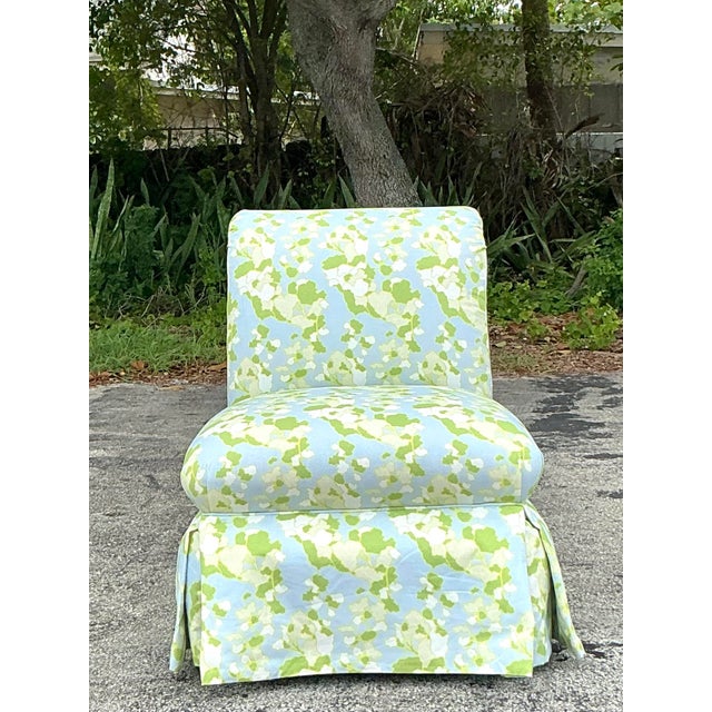 Indulge in timeless elegance with this exquisite vintage Regency slipper chair, beautifully upholstered in the coveted...