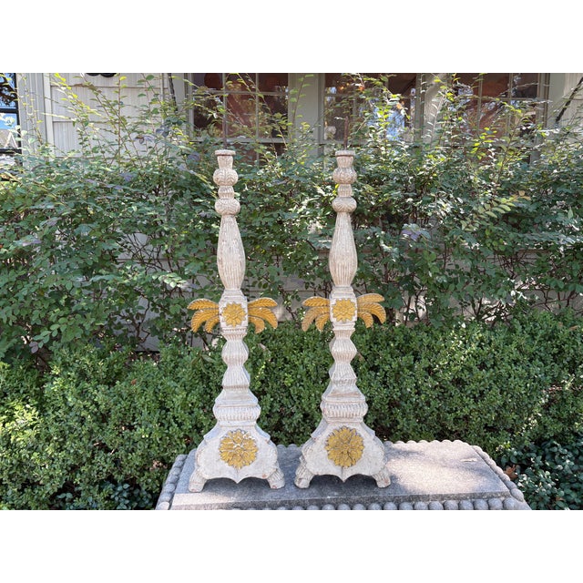 Pair Of 19th Century Italian Baroque Style Candlesticks. Pair of 19th century Italian Baroque style painted altar sticks,...