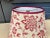 A lampshade handmade made from a vintage Brunschwig & Fils printed cotton. Measurements: top 7” bottom 11” side 8”