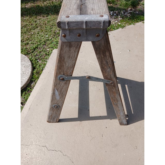 Vintage well used rustic step stool or two step ladder, mid-century. Beautiful weathered wood and the wear is essential to...