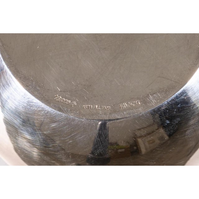 A four piece sterling silver tea set attributed to Margret Craver by Towle. A absolutely stunning set of items with...