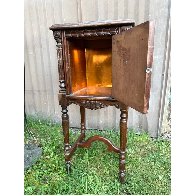 Nice walnut antique smoking stand with copper lined humidor cabinet, would work well as a side table for decor. 16ʺW ×...