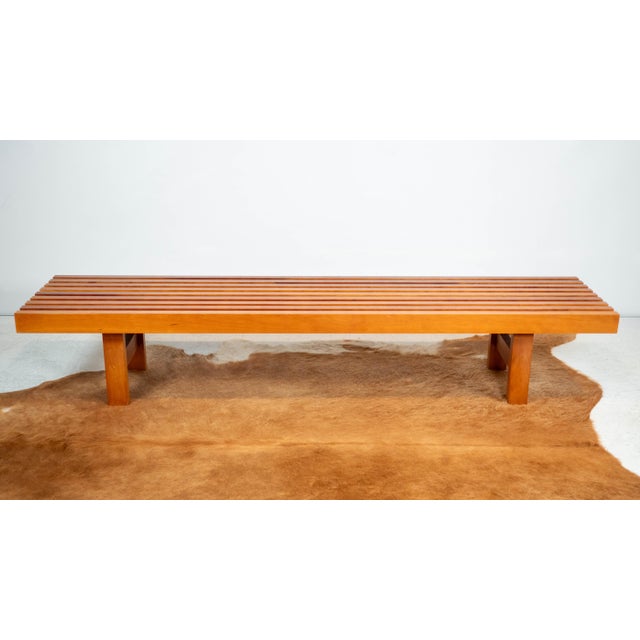 Mid Century Charles Webb cherry wood slat bench, circa 1990s. Amazing craftsmanship. Nine thick wooden slats held together...