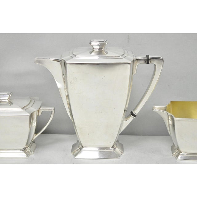 Antique 1847 Rogers Bros "Legacy" Art Deco Silver Plated Tea Set - 3 Pc Set. Set includes (1) teapot (1) covered sugar...