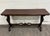 This is a gorgeous vintage Tudor or Spanish Revival style sofa table, console table, or hall table featuring an elegant...