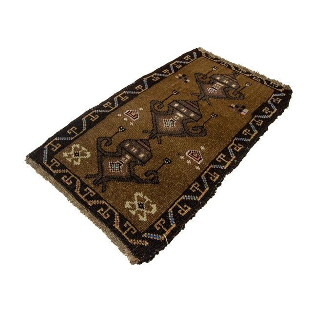 Vintage Handknotted decorative mini rug from Kars region of Turkey. Approximately 45-55 years old. In very good condition.