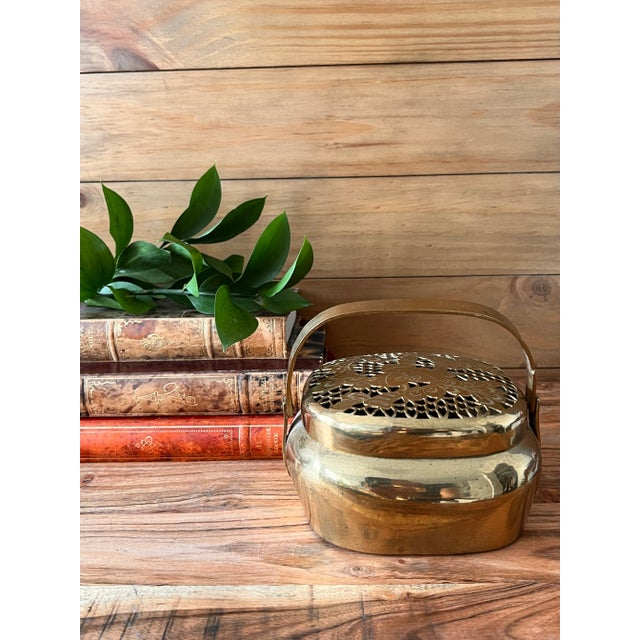 Antique brass Chinese square shape hand warmer with handle and pierced cover. In excellent condition. The inside is worn ,...