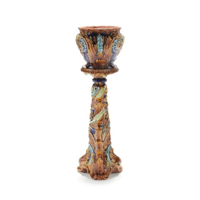 A stunning antique jardinière that beautifully embodies the Italianate Rococo style of the late 19th century. At 43 1/2...