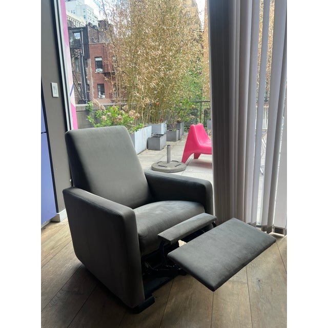 Monte Design well-proportioned reclining glider in a soft charcoal upholstery. A clean, architectural silhouette with a...