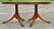 Duncan Phyfe / Regency style oval extension dining table. Double pedestal base with reeded legs and turned central...