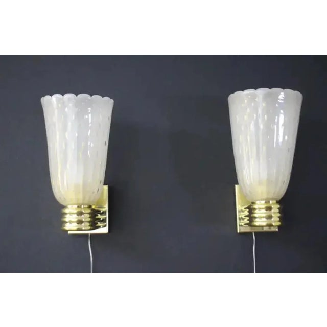 This fabulous pair of Venetian sconces of modern or Art Deco style, was entirely handcrafted. It is all decorated with the...