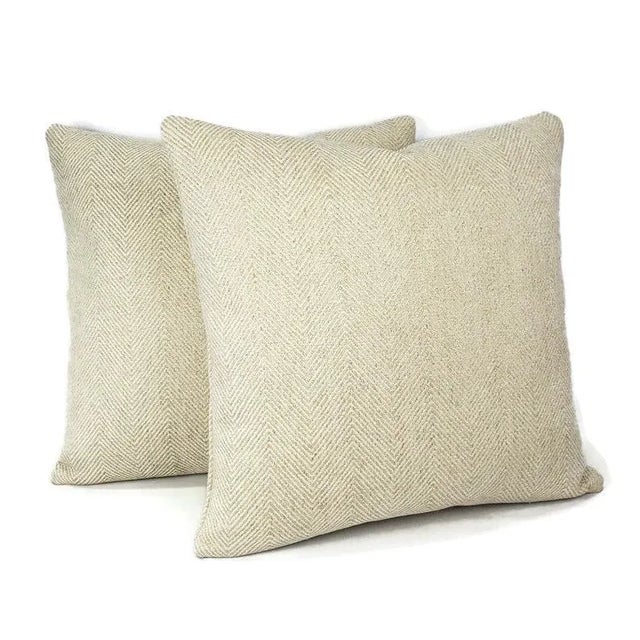 From GP& J Baker is Braddock in the color Oatmeal pillow cover. This pillow features cream chenille threads woven into a...