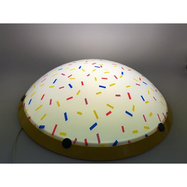 *a plafon *with typical patterns in the primary colors *Rare draft "Disco 60" *The smaller version "Disco 45" can be found...