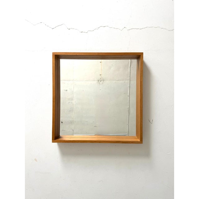 Oak Framed Mirror – 1970s A stylish and timeless mirror featuring thick, clean-lined oak framing. The solid construction...