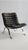 A handsome example of Swedish modern design, the "Ari" lounge chair was designed by Arne Norell and produced by Norell...