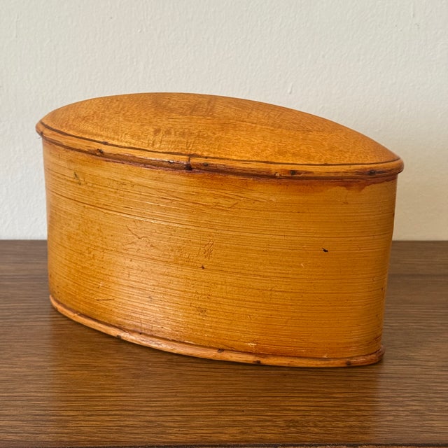 Vintage Thai Akha Hill Tribe bamboo and rattan tobacco box featuring traditional handwoven construction and a fitted lid....