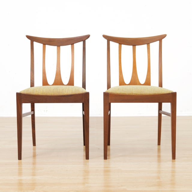 This stunning set of six dining chairs were designed by G Plan during the 1960s. Produced in afromosia they became known...