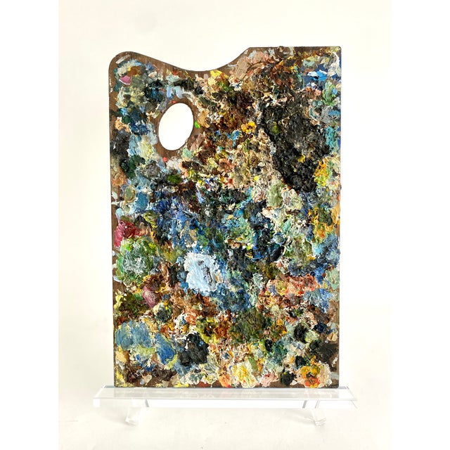 This exceptional vintage French painter's palette while a byproduct of an artist's creative endeavors, is a 3-D art...