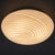 A refined light fixture with a timeless design, perfect for elegantly illuminating entryways, bedrooms, or living areas,...