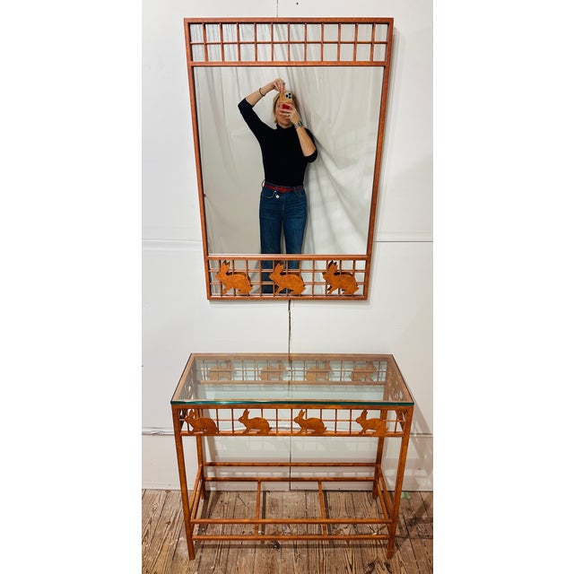 20th century hand forged wrought iron & glass console table & matching mirror two piece set. Rabbit motif throughout....