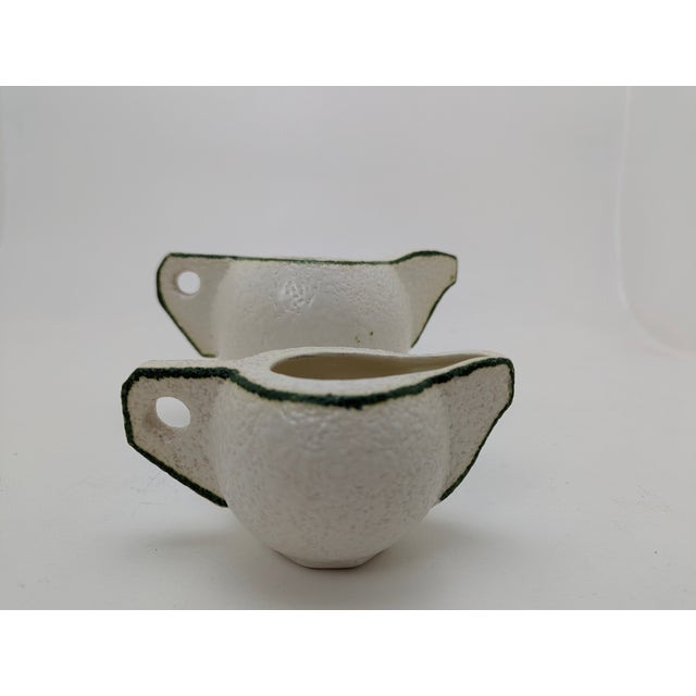 An unusual design set and a beautiful example of Art Deco ceramics in the Cubist style. More of a display piece for...