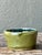 This vintage handcrafted studio pottery bowl is a refined example of mid-20th-century artisanal ceramic work,...