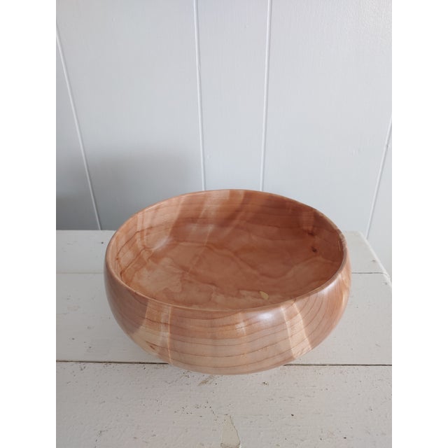 Here's a beautifully crafted artisan bowl consisting of yellow birch burl wood. The natural patterns on this piece flow....