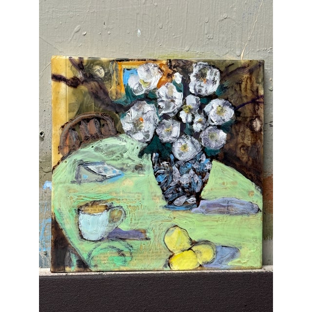“Brie and Tea" is a luminous, highly tactile original still life that bridges intimate, everyday leisure with rich...