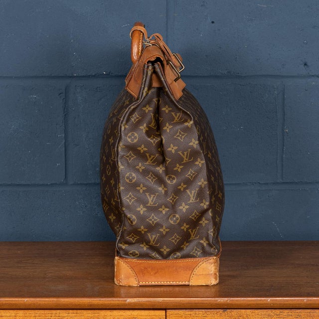A lovely louis vuitton steamer travel bag in monogram canvas and natural tan leather, made in france in the latter quarter...