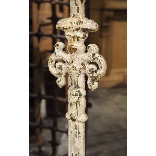 More information coming soon… Dating to circa 1900, this hand-painted iron railing has been repurposed as a console base...