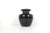 This is a great looking simple black ceramic vase made in West Germany in the 60’s. It is mid century modern style and...
