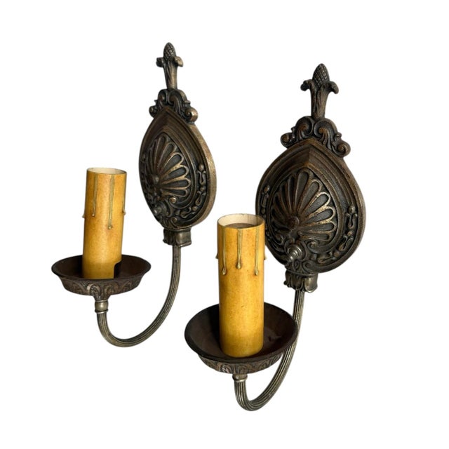 Great old bronze patina. The ornate design is similar to a teardrop shaped fan. Great in any room of your home. These...