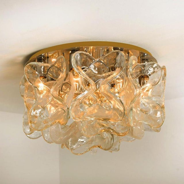 Glamorous chrome and murano glass flushmount ‘catena’ by kalmar. Large "ribbons" in clear and bubble murano glass are...