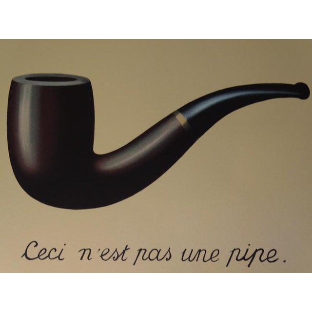 Rene Magritte (d'après) La Trahison des Images Lithograph on BFK Rives vellum. Signed in the plate Numbered / 300 copies...