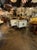 The product is a pair of elegant side tables made of Murano white glass and brass. These tables feature a sleek and modern...