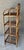 Charming Mid 20th-Century Four-Tier Decorative Tortoiseshell Rattan Storage Shelf For Sale - Image 4 of 17