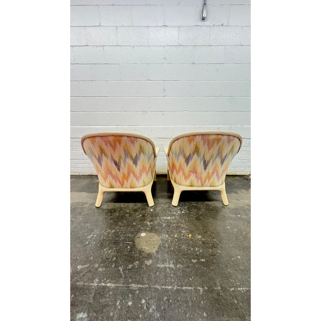 A stunning pair of Baker Furniture Company lounge chairs that perfectly capture the organic sophistication of the 1980s....