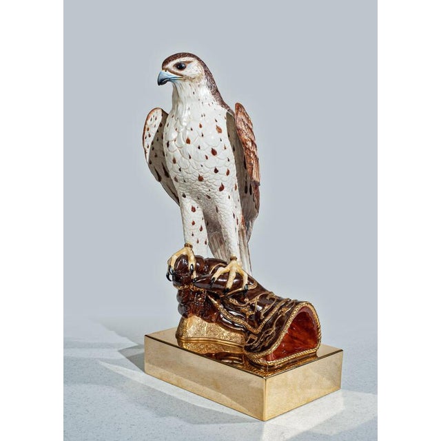 Handcrafted in Italy, this limited edition Saker falcon sculpture is finely formed in porcelain and hand painted with...