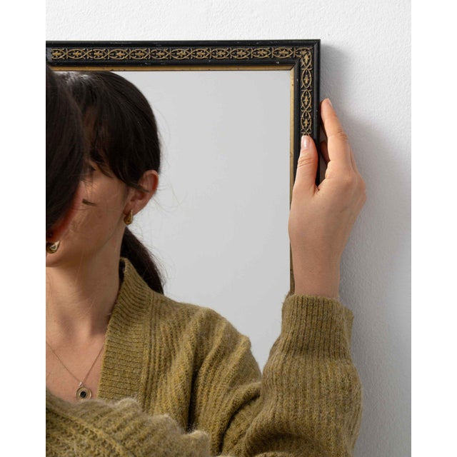 This mirror carries genuine presence, its dark bronze thin frame, rectangular immediately setting the tone for the piece....